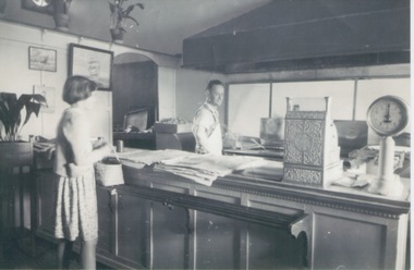 Photograph, Dimitri Sofianos in his fish shop, Late 1940s