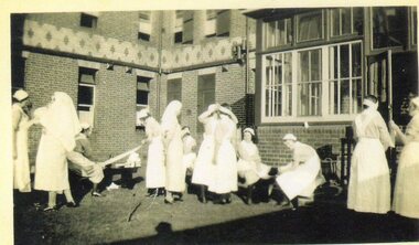 Nurses learning to bandage 1933, photograph, 1930's