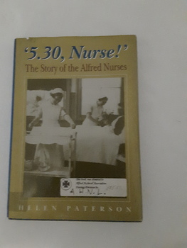 Hardcopy illustrated book with nursing stories of the Alfred Trainees. Book bound with blue material. Title and author in gold letters on spine. AHNL badge embossed on front.
Dust jacket has title and author on both front and spine, photos of nurses on front and back. Contains photos