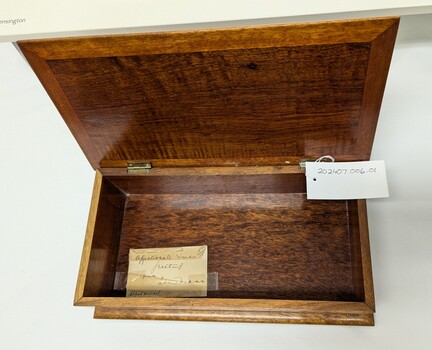 Handcrafted wooden box with parquetry Maltese cross in center