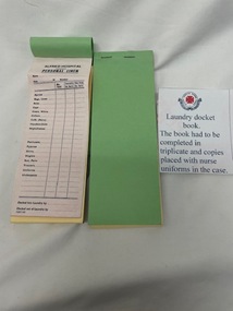 Photograph of laundry docket book, used by nurses when sending items to the laundry.