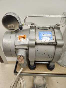 Clements Suction and Pressure Pump reverse side including all attachments.