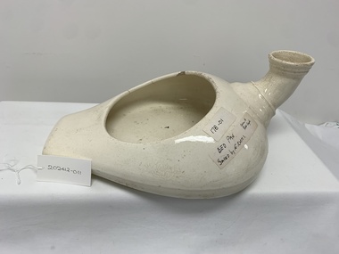 Functional object - combined ceramic bedpan and urinal, donated July 1994