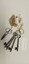 Key chain [reproduction] with small metal scissors and 4 keys that hang from the belt of the nurses uniform.