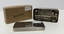 Picture shows a small cardboard box used to hold the small metal  box containing glass syringes and metal needles. Cardboard box and metal box have RECORD stamped on the lid.
