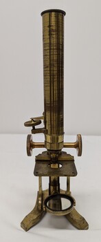 Brass and glass microscope made of 3 parts. Brass body, eye piece and eye piece adaptor