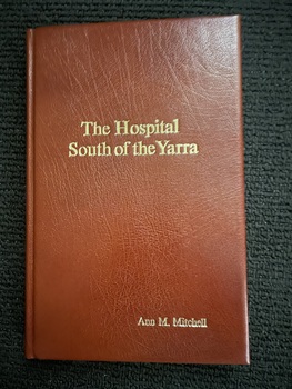 Brown hard cover book with gold embossed title.