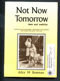 Paperback, illustrated book titled- Not now tomorrow=ima nai ashita. Dustjacket cover photo shows 2 nurses in uniform in front of a building of the Namanalu Hospital, Rabaul is behind them (1939). 
