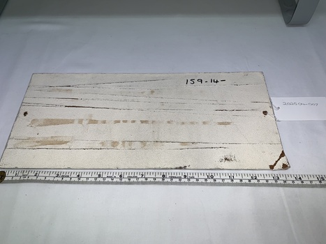 MASONITE WITH PAINTED SURFACE - CREAM - SOME DAMAGE TO SURFACE. NUMBER WRITTEN IN BLACK PEN UPPER RIGHT MARGIN - 159-14-