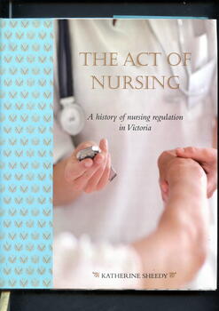 Illustrated hardcover book. Illustrated book with dust jacket. The remainder of the covers have repeated images of various Victorian Nurses board Badges on a white background . Dust jacket has similar images on pale blue background. On the front is an image of one person (torso only) holding another's wrist and holding a watch in their other hand and part of a stethoscope is also visible. 