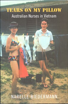 Illustrated paperback book. Front cover has a coloured photograph of two women hanging out laundry (nurses Vung Tau, 1968), title and author's name are printed over this photo. The back cover has a summary of the book printed on a light brown background, along with three photographs: a nurse on duty (Diane Lawrence) two women in khaki sitting on sandbags, and a woman in uniform holding a young boy (Terrie Roche with 'Rabbit" the young mascot of the Civic Action Team).