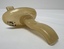 Vintage resuscitube airway device, yellowed plastic with markings, angled handle for emergency breathing assistance, shown on a white background.