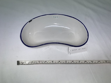 white enamel kidney dish, blue rim, some damage to surface edge, tipex to interior surface of back edge - number in black ink 39.01.3