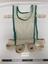 white mesh vest with green trim, off white cotton woven fabric strapping