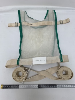 white mesh vest with green trim, off white cotton woven fabric strapping