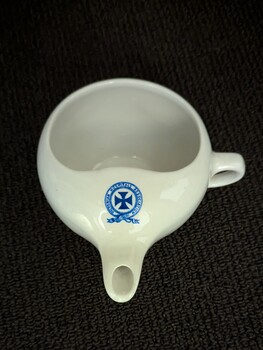 Top view of Victorian Hospitals Association Feeding Cup