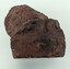 Top view of broken dark red brick