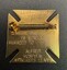 A gold cross-shaped medal with the inscription "Louisa Mann Medal for General Proficiency in Nursing, Awarded to Alfred Hospital Nurses League.
