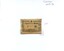 Front of packet containing two japanese silk surgical sutures, mounted on white card
