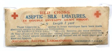 Front view of Red Cross aseptic silk ligatures in double envelope