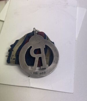 Reverse of Queen Alexandra's Imperial Military Nursing Service Reserve (QAIMNSR) badge