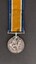 Reverse of British War medal with attached ribbon