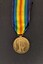 Front of Victory Medal with attached ribbon