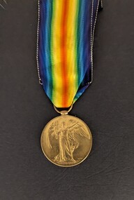 Front of Victory Medal with attached ribbon