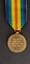 Reverse of Victory Medal with attached ribbon