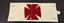 Fabric cross on white armband
