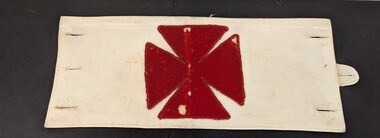 Fabric cross on white armband