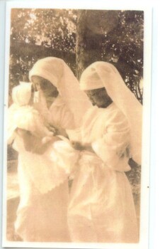 Two children dressed as nurses [ca.1920]