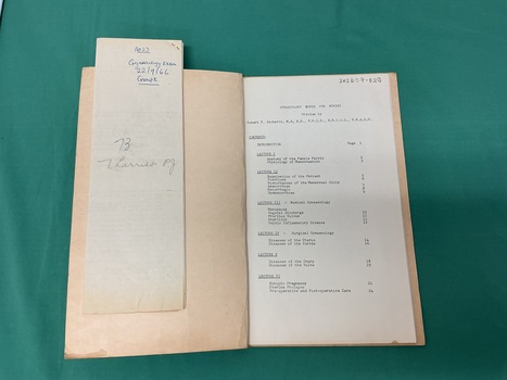 Index page Alfred Hospital Gynaecology Lectures [ca.1960’s] on right hand side.
On left hand side is a folded foolscap cream exam paper with a staple in top right corner.