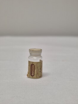 Front view of Dramamine vial