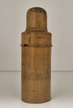 Woode container concealing glass bottle