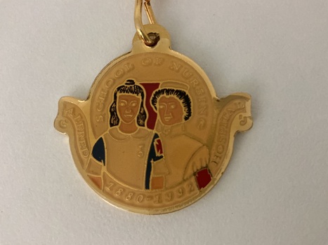 front of Alfred Hospital School of Nursing key ring