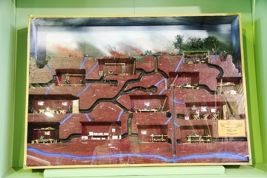 Diorama of underground tunnel complex used by the Viet Cong for shelter and medical facilities.