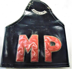 Vinyl black arm band with MP  (Military Police) in red as worn by provost in Vietnam war.