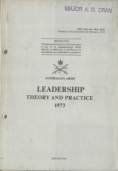 A greyish coloured cardboard cover with black information on the front. Top right hand corner is the name of Major A.D. Cran. 