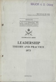 A greyish coloured cardboard cover with black information on the front. Top right hand corner is the name of Major A.D. Cran. 