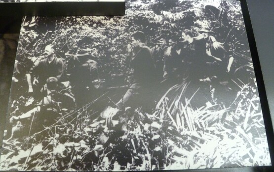 A black and white image of eleven soldiers