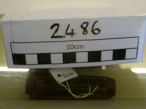 A damaged flash eliminator from a M60 machine gun. 