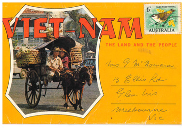 An orange coloured postcard with the words "Vietnam the land and the people" with a green postage stamp featuring yellow-tailed Thornbill. 