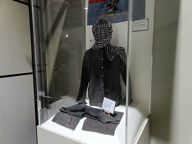 Two piece black cotton top and pants, commonly known as the "Peasant Look" or black pajamas.