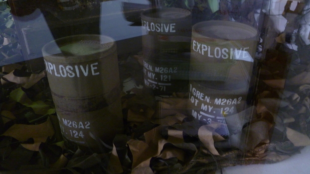 Olive green cylinder to house hand grenade