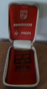 Black vinyl zip up case with red lining and white lettering inside