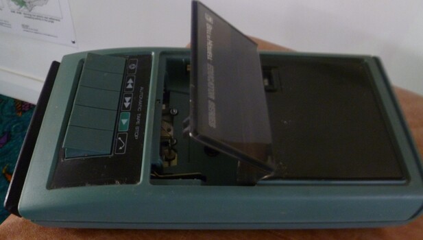 Dark green metal and plastic battery operated cassette player