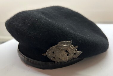 Black wool beret with leather trim