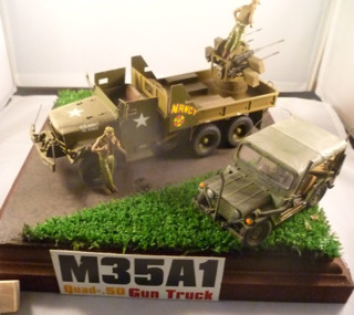 A diorama of US Army Gun M35A1 Quad 50 Gun Truck