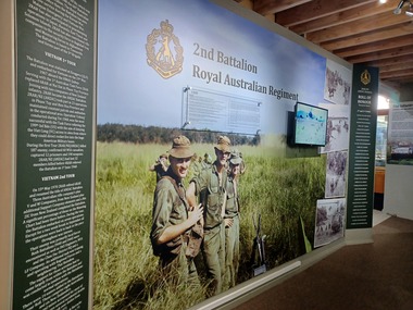 A large coloured poster 2nd Battalion Royal Australian Regiment.